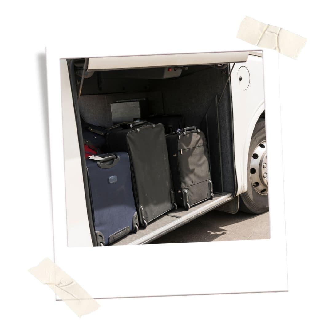 Luggage under bus storage. 