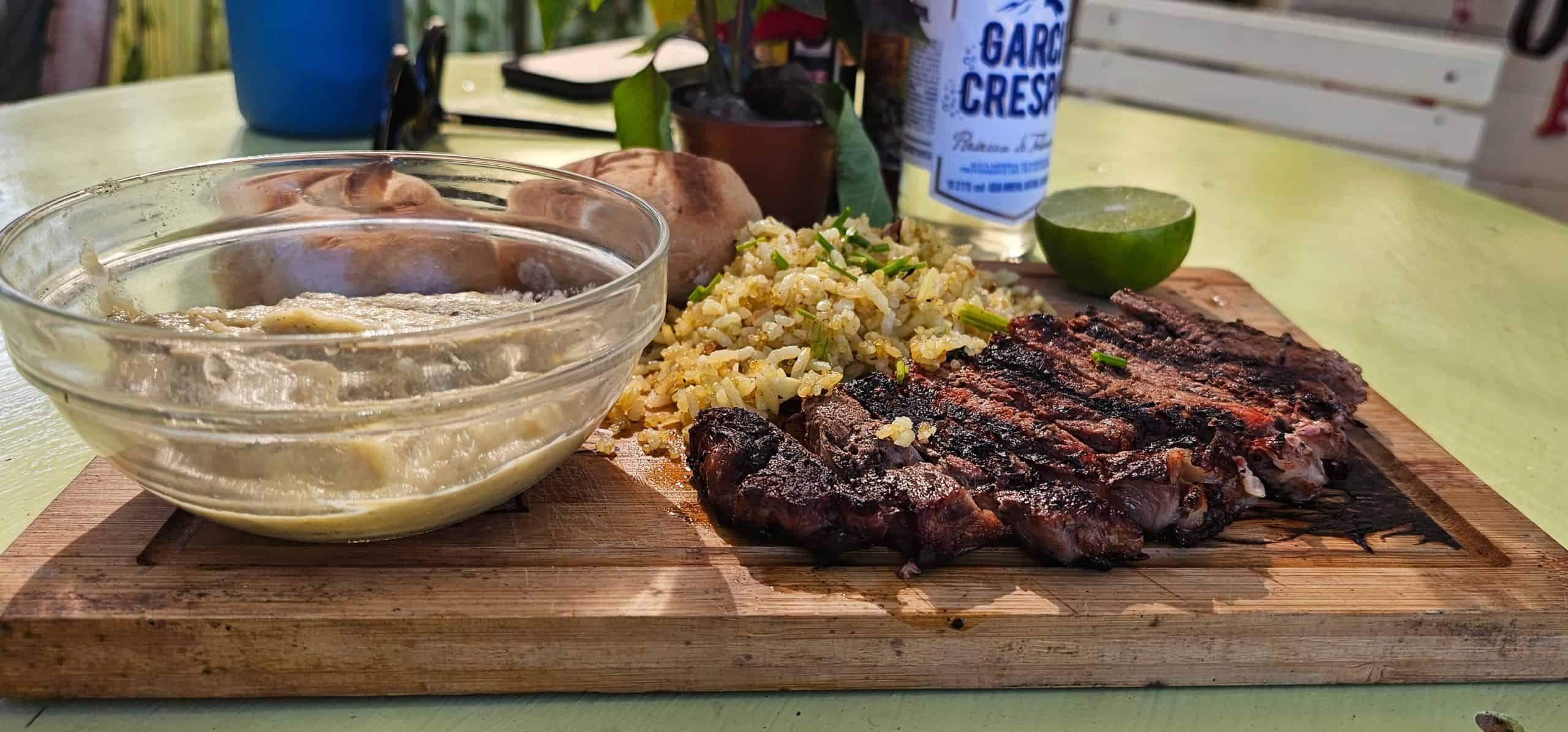 Rib eye steak on wood plank at Papu's Food Truck - a Sayulita hidden gem