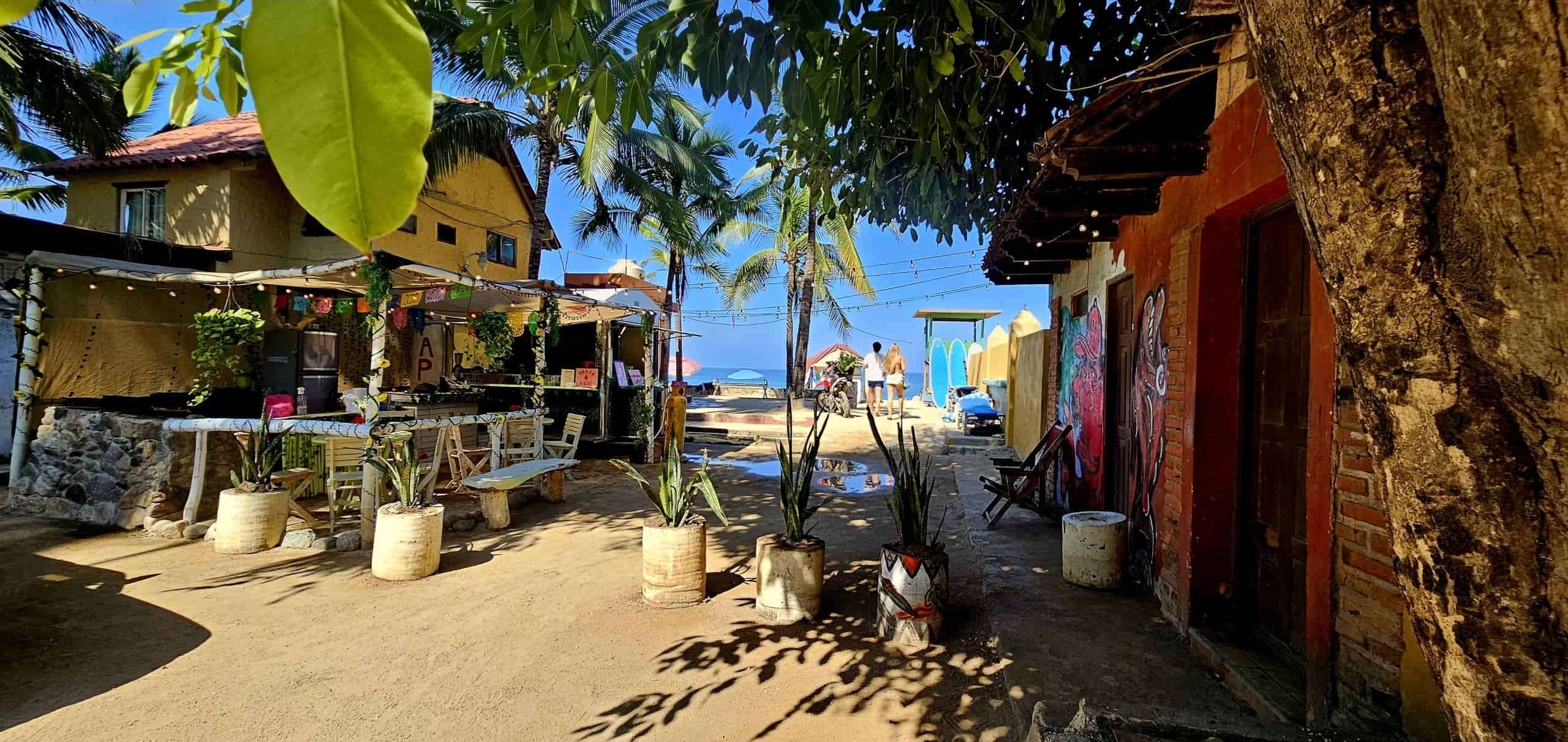 Papu's food truck, a Sayulita Hidden Gem surrounded by palm trees and blue skies
