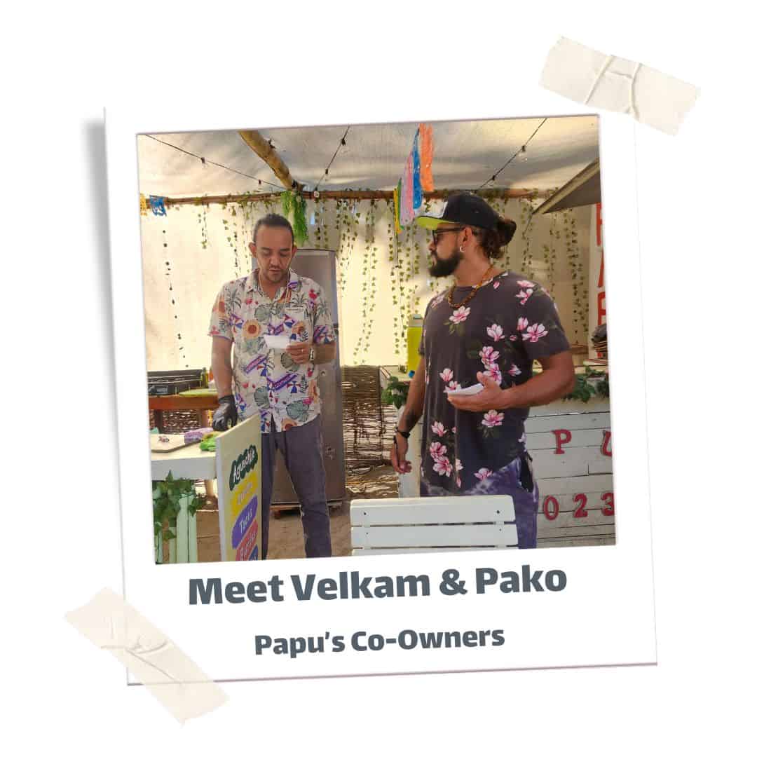 Papu's Food Truck owners standing inside the restaurant.