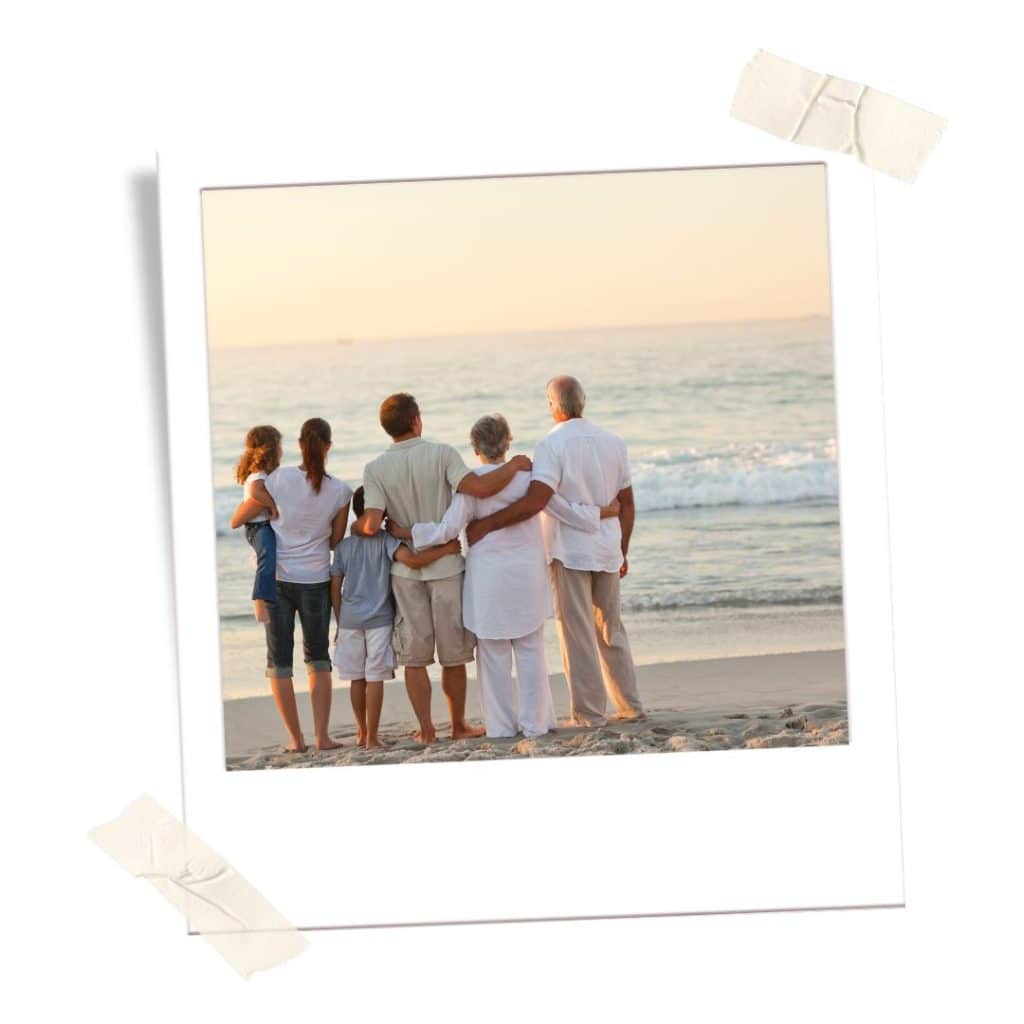 Family photo at the beach in Mexico because it's safe for families